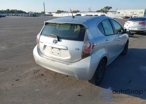 2014 Toyota Prius C One from USA, damaged, VIN JTDKDTB37E1062017